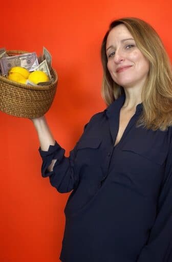 Jen with basket of lemons and money