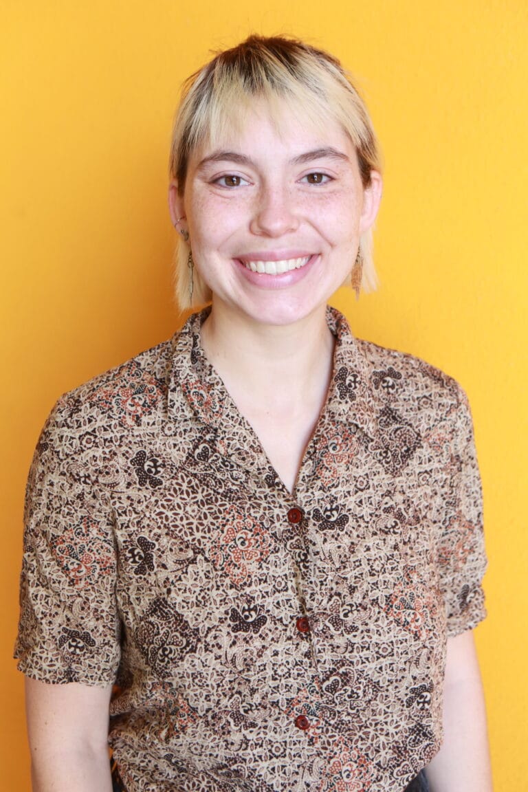 Melina in patterned button up