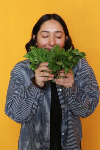 Franchesca holding herbs